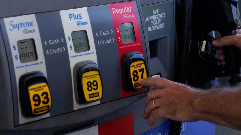 A man pumping his own gas