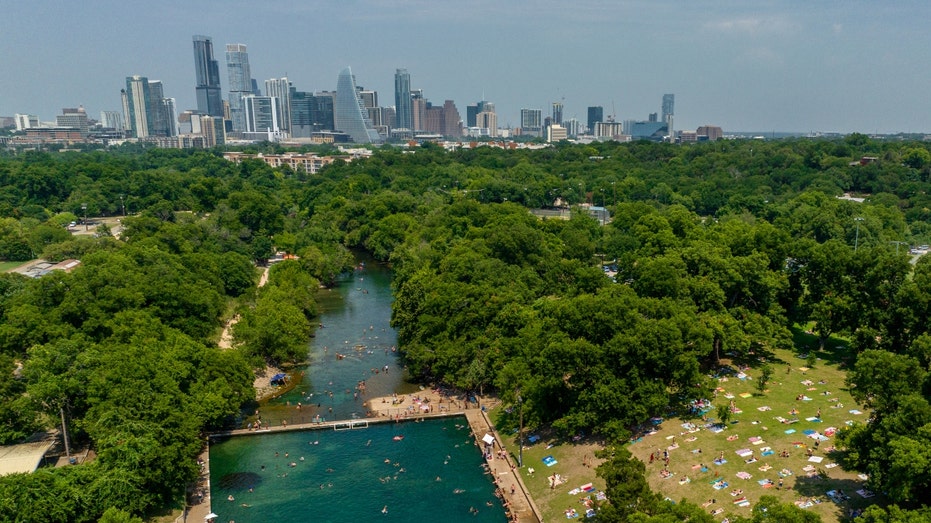 People at a pool on June 21, 2023, in Austin, Texas