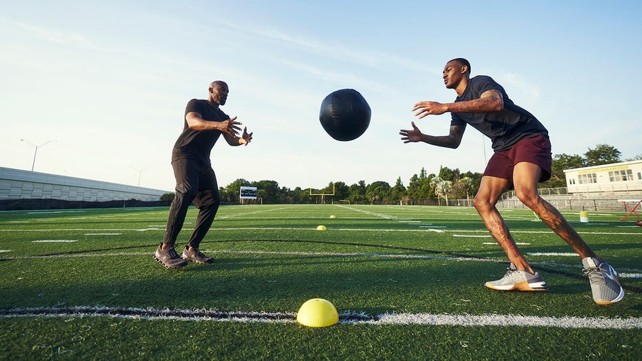 DeVonta Smith works out with trainer