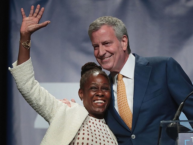 CEDAR RAPIDS, IOWA - JUNE 09: Democratic presidential candidate and New York City Mayor Bill De Blasio introduces his wife Chirlane McCray while speaking at the Iowa Democratic Party's Hall of Fame Dinner on June 9, 2019 in Cedar Rapids, Iowa. Nearly all of the 23 Democratic candidates running for president were campaigning in Iowa this weekend. President Donald Trump has two events scheduled in the state on Tuesday. (Photo by Scott Olson/Getty Images)