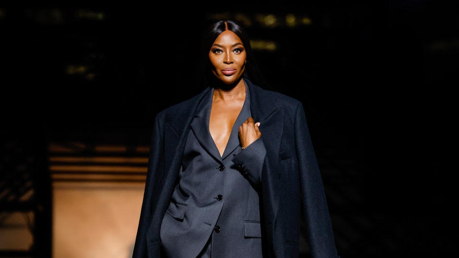 naomi campbell on runway at milan fashion week