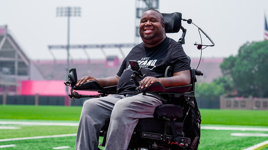 Eric LeGrande smiles on field