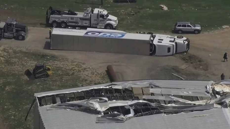 A truck is overturned and the Pfizer plant is damaged