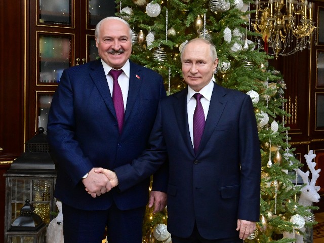 Russian President Vladimir Putin, right, and Belarusian President Alexander Lukashenko pose after their talks in Minsk, Belarus, Monday, Dec. 19, 2022. (Andrey Stasevich, Press Service of Belarusian President/Sputnik, Kremlin Pool Photo via AP)