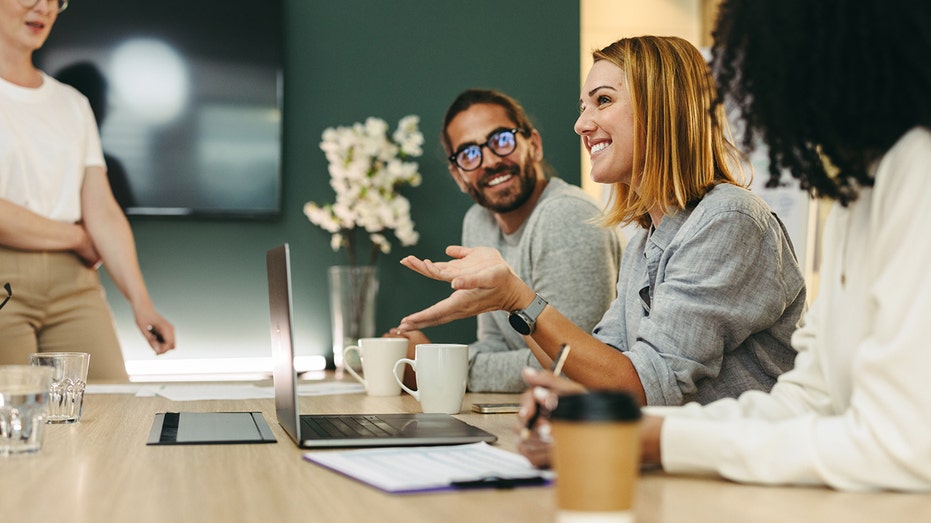 people at an office together