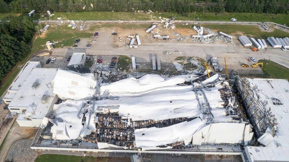 Debris is scattered around the Pfizer facility