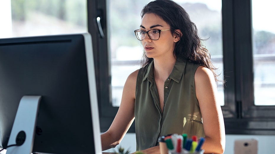 woman working on computer in office