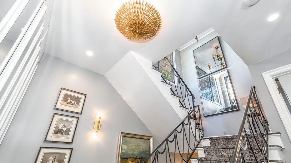 Lit up light and staircase in Liberace's home