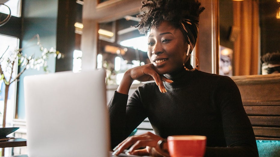 young woman working at a cafe