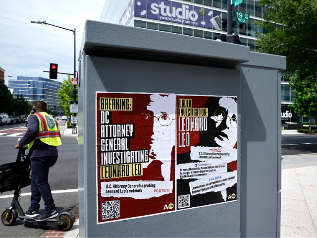 WASHINGTON, DC - AUGUST 24: Government watchdog Accountable.US places posters around the Federalist Society building to highlight news of DC Attorney General Brian Schwalb's investigation into Leonard Leo's nonprofit network on August 24, 2023 in Washington, DC. (Photo by Paul Morigi/Getty Images for Accountable.US)