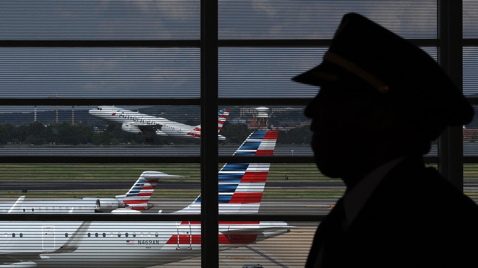 A plane, gate agent