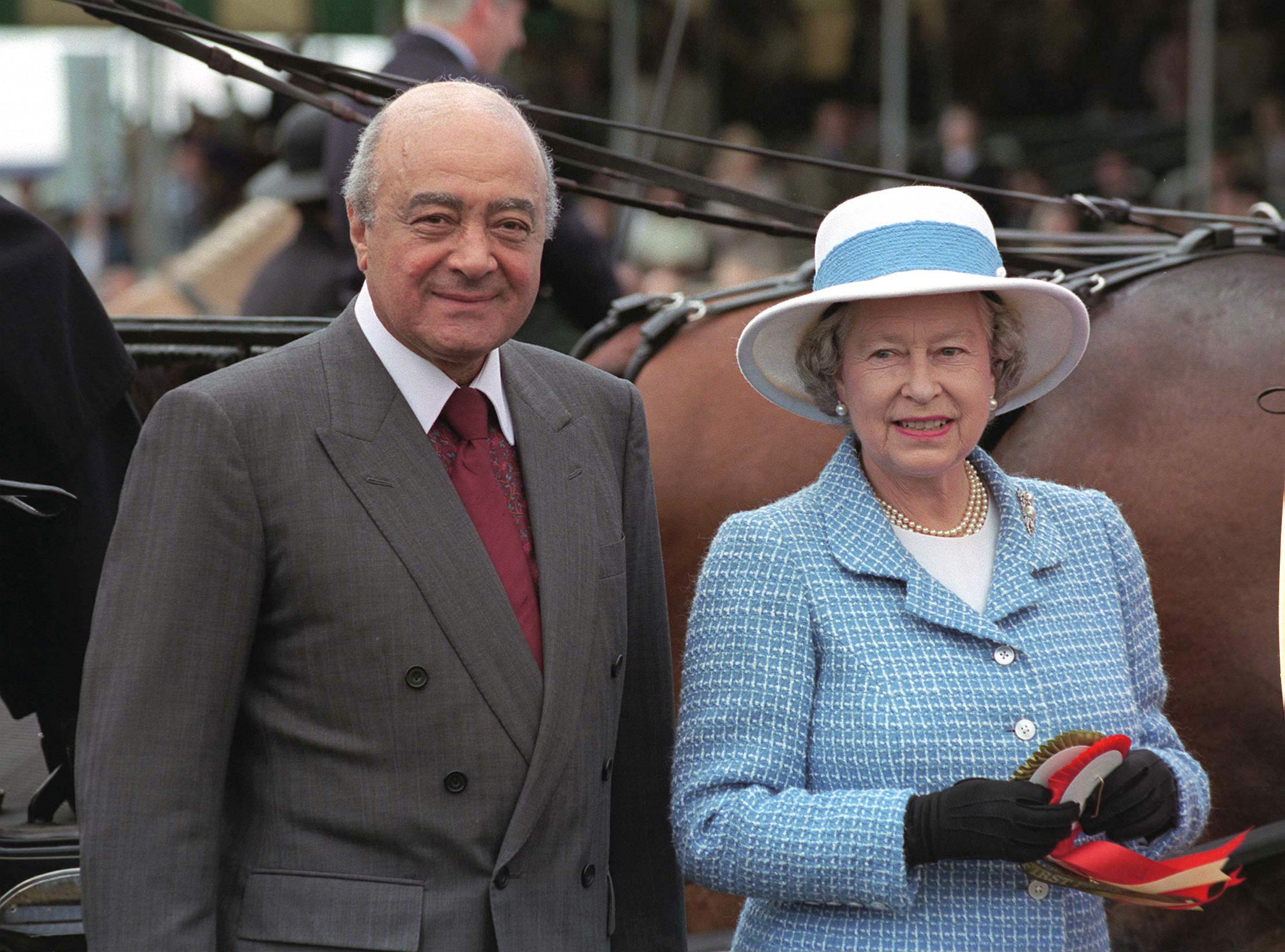 WINDSOR, UNITED KINGDOM - MAY 18: The Queen With Mohammed Al Fayed, Owner Of Harrods - The Sponsors Of The Royal Windsor Horse Show (Photo by Tim Graham Photo Library via Getty Images)