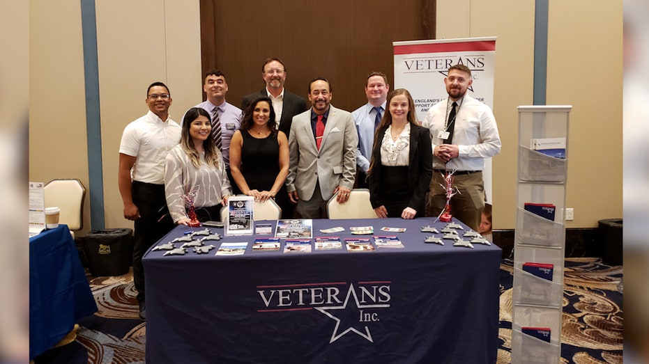 Veterans Inc. staff gathered at table