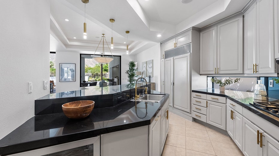 kitchen with black countertops 