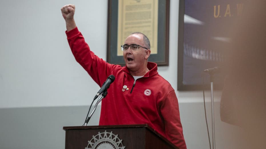 UAW President Shawn Fain speaks at a rallly