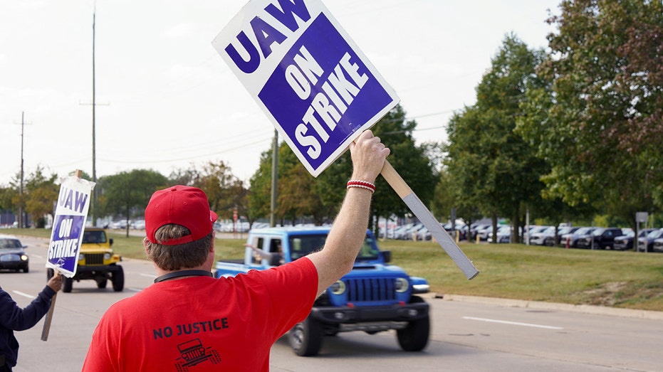 Worker with a sign