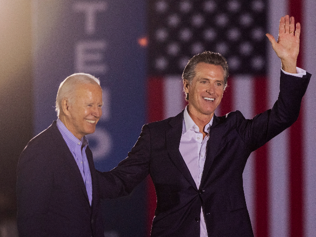 LONG BEACH, CA - SEPTEMBER 13: U.S. President Joe Biden and California Gov. Gavin Newsom wave to the crowd as they campaign to keep the governor in office at Long Beach City College on the eve of the last day of the special election to recall the governor on September 13, 2021 in Long Beach, California. Forty-six candidates, mostly Republicans, are attempting to overthrow the governor in the recall election a year ahead of the regularly scheduled gubernatorial vote. (Photo by David McNew/Getty Images)