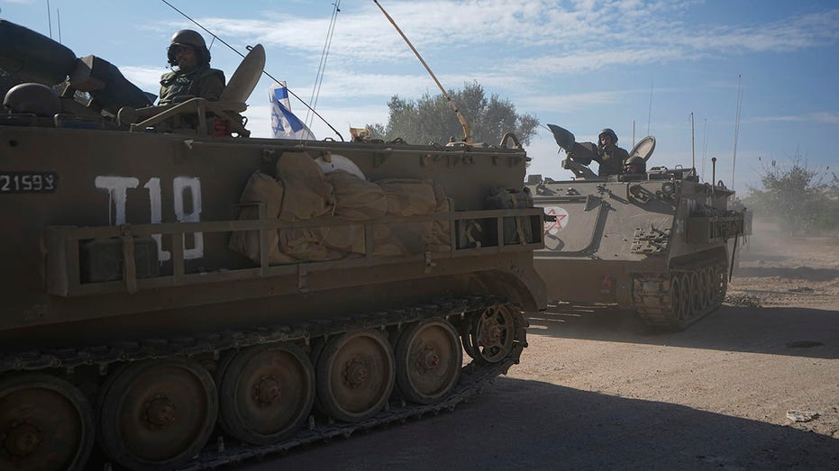 Israeli soldiers move near Gaza Strip