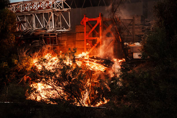 Fire breaks out outside an industrial facility after a rocket lands in the area, a few miles outside of Gaza, near Sderot, Israel, Monday, Oct. 9,...