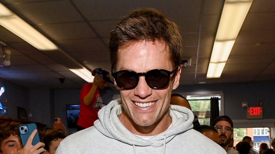 Tom Brady smiles