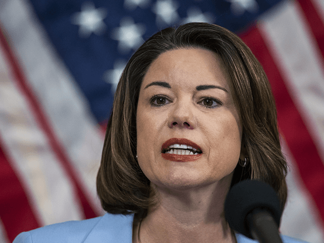 Rep. Angie Craig, D-Minn., speaks during news conference unveiling of the Patient Protection and Affordable Care Enhancement Act on Capitol Hill in Washington on Wednesday, June 24, 2020. (AP Photo/Manuel Balce Ceneta)