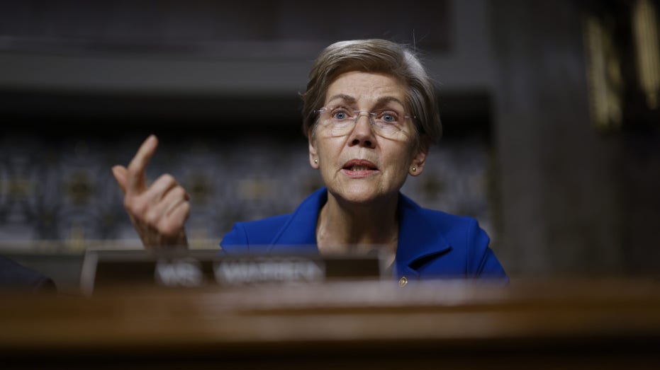 Massachusetts Senator Elizabeth Warren asks questions during a Senate Banking Committee hearing on FTXs collapse