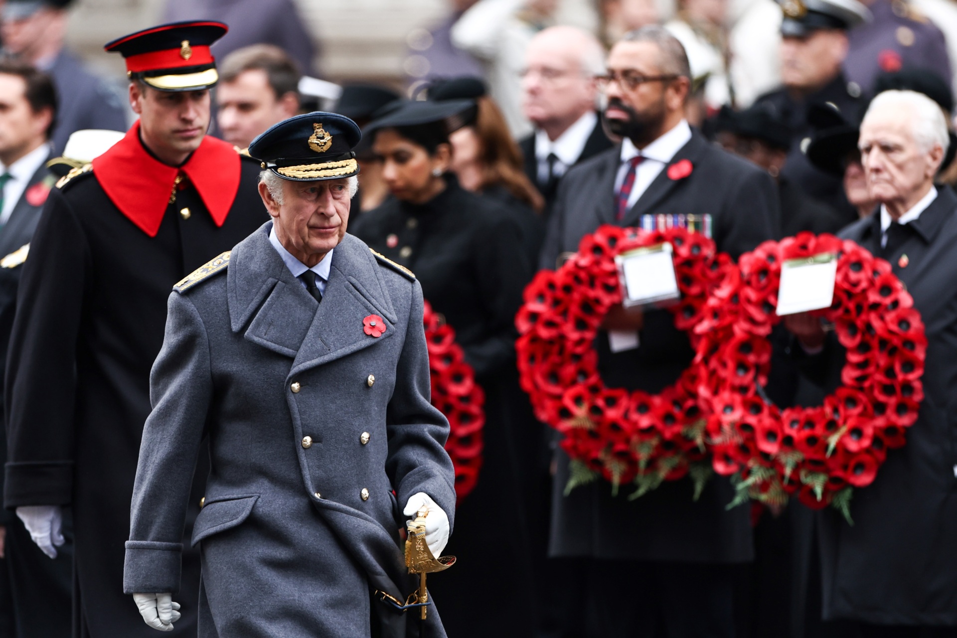 LONDON, ENGLAND - NOVEMBER 12: King Charles III followed by Britain's Prince William, Prince of Wales (L), arrives to attend the National Service of Remembrance at The Cenotaph on November 12, 2023 in London, England. Every year, members of the British Royal family join politicians, veterans and members of the public to remember those who have died in combat. (Photo by Henry Nicholls - WPA Pool/Getty Images)