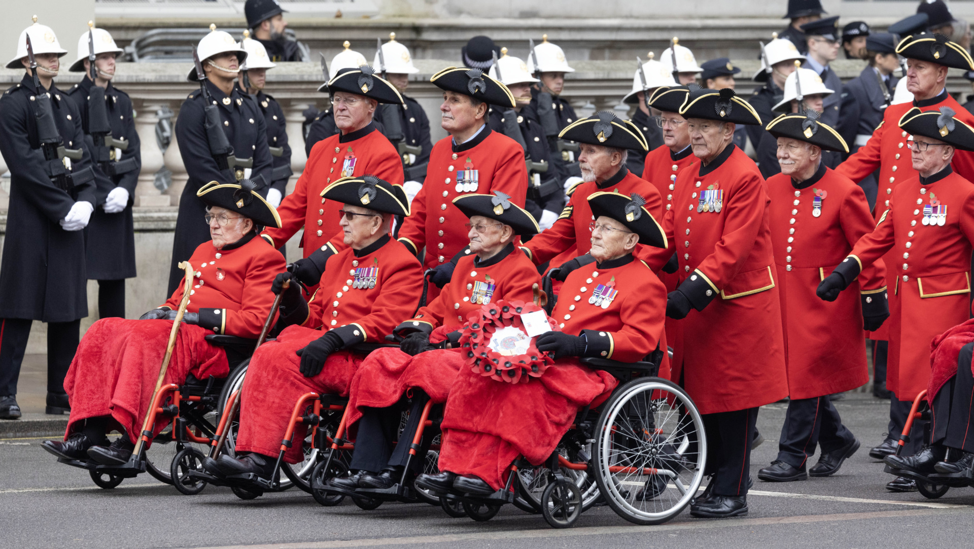 LONDON, ENGLAND - NOVEMBER 12: Veterans march during the Remembrance Sunday ceremony at the Cenotaph on Whitehall on November 12, 2023 in London, England. Every year, members of the British Royal family join politicians, veterans and members of the public to remember those who have died in combat. (Photo by Richard Pohle - WPA Pool/Getty Images)