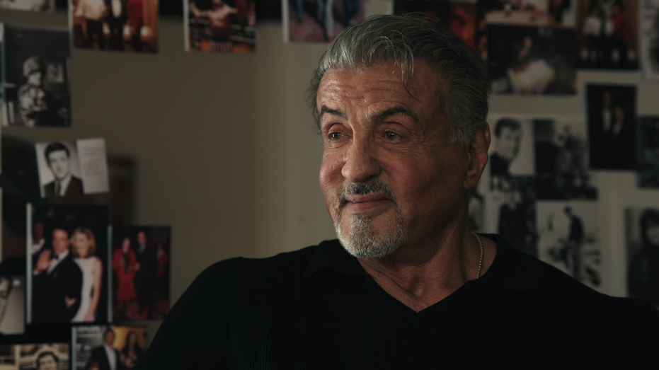 Sylvester Stallone sitting and smiling in documentary