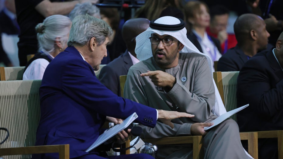 Sultan aj Jaber and John Kerry