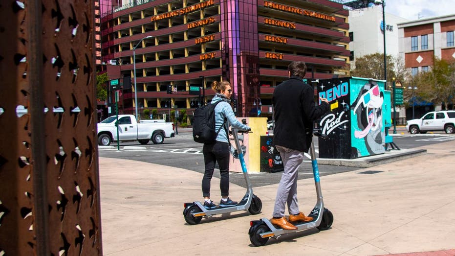 Customers ride Bird scooters in Reno