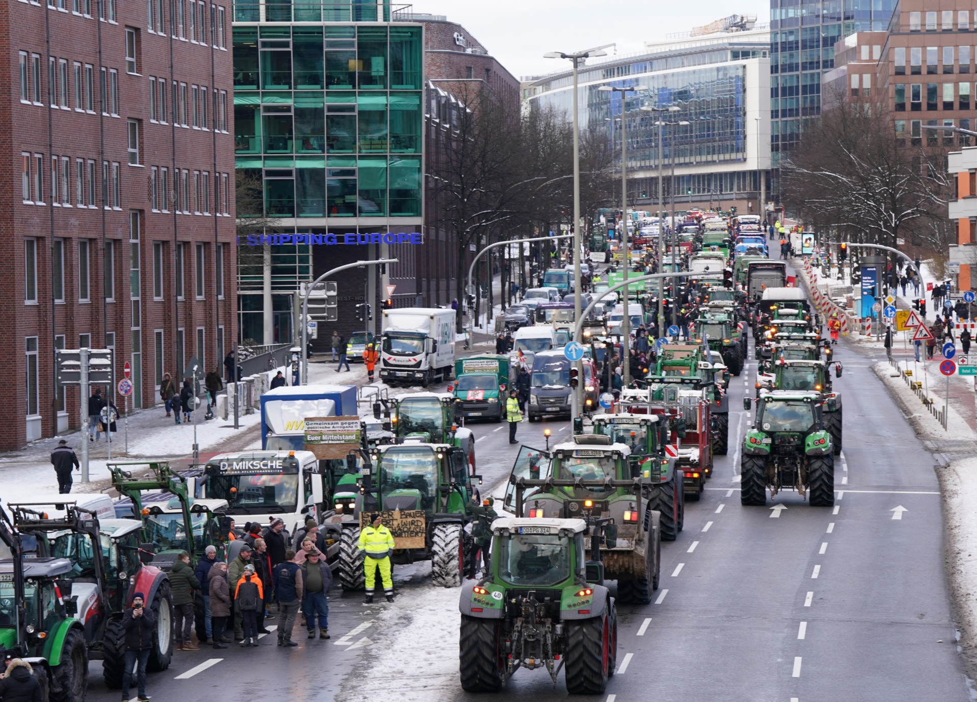 08 January 2024, Hamburg: Tractors are parked in the city center after a rally as part of the farmers' association's week of action. In response to the federal government's austerity plans, the farmers' association has called for a week of action with rallies and rallies starting on January 8. It is to culminate in a major demonstration in the capital on January 15. Photo: Marcus Brandt/dpa (Photo by Marcus Brandt/picture alliance via Getty Images)