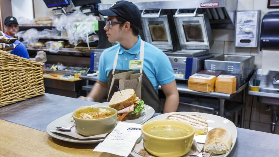 Panera worker standing at grill