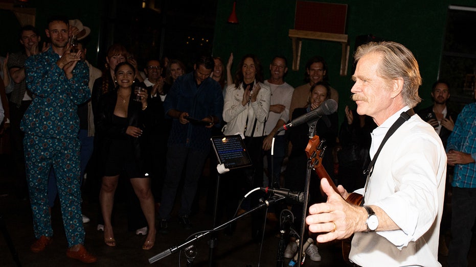 William H. Macy playing the ukelele