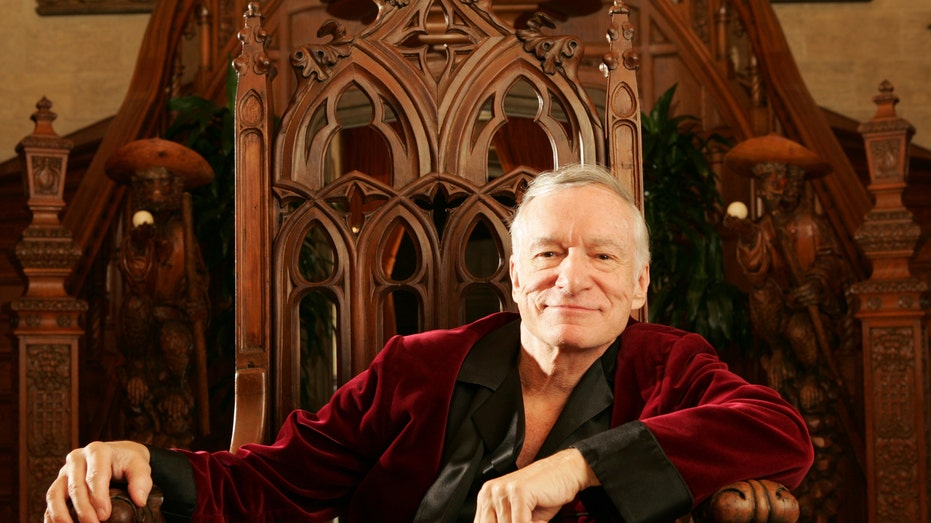 Hugh Hefner wearing his smoking jacket