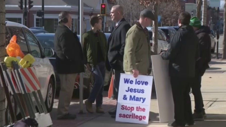 Protestors gather outside small business in Wisconsin