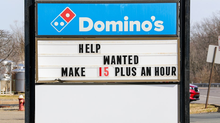 Dominos sign