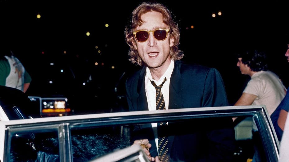 John Lennon stepping out of vehicle in 1980