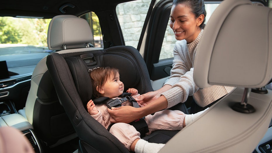 uber car seat mother and daughter