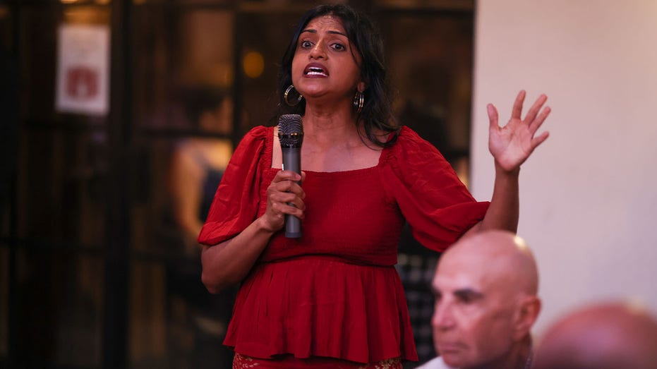 Saru Jayaraman wearing a red dress