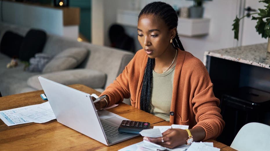 Woman budgeting at a desk